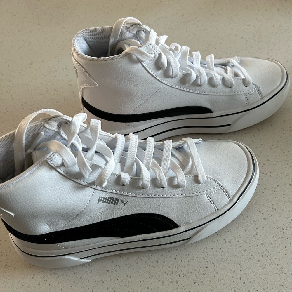 New never worn Puma platform leather high tops
